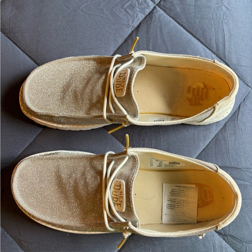 Hey Dude Women's Wally Sparkle Slip-Ons in Champagne